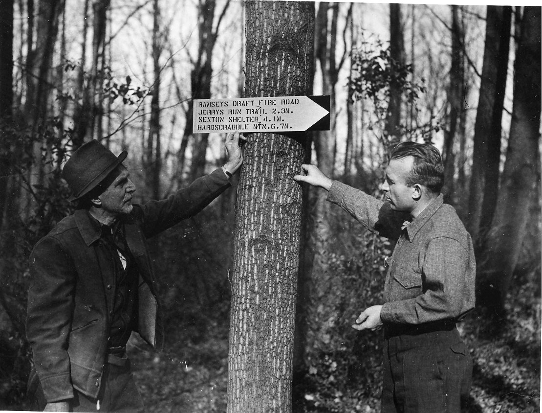 Myron Avery discussing marker (Courtesy of the Appalachian Trail Conservancy)